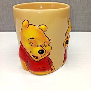 Disney Store Winnie the Pooh 3D Ceramic Mug 16 oz Yellow Red Embossed Coffee Cup